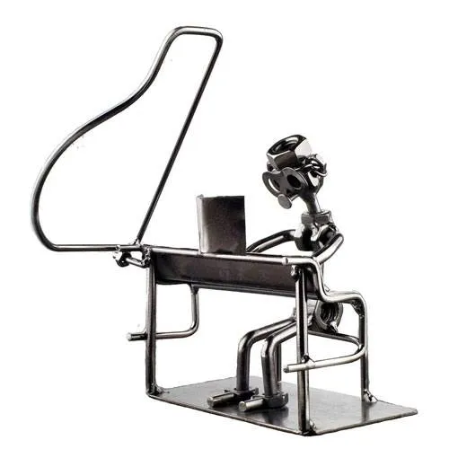 handcrafted pianist figurine