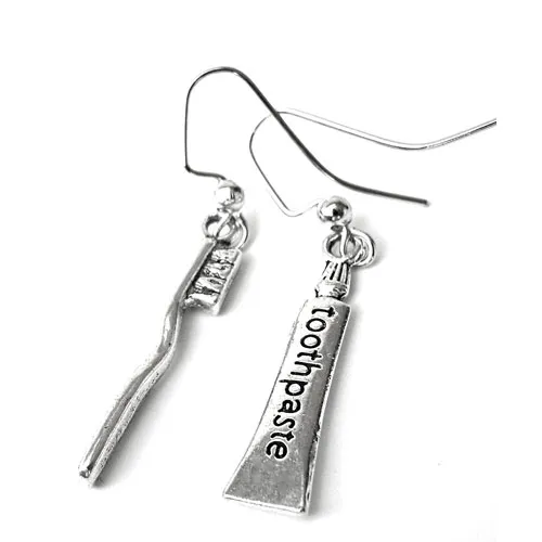 toothbrush toothpaste earrings
